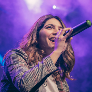 Singer on stage performing